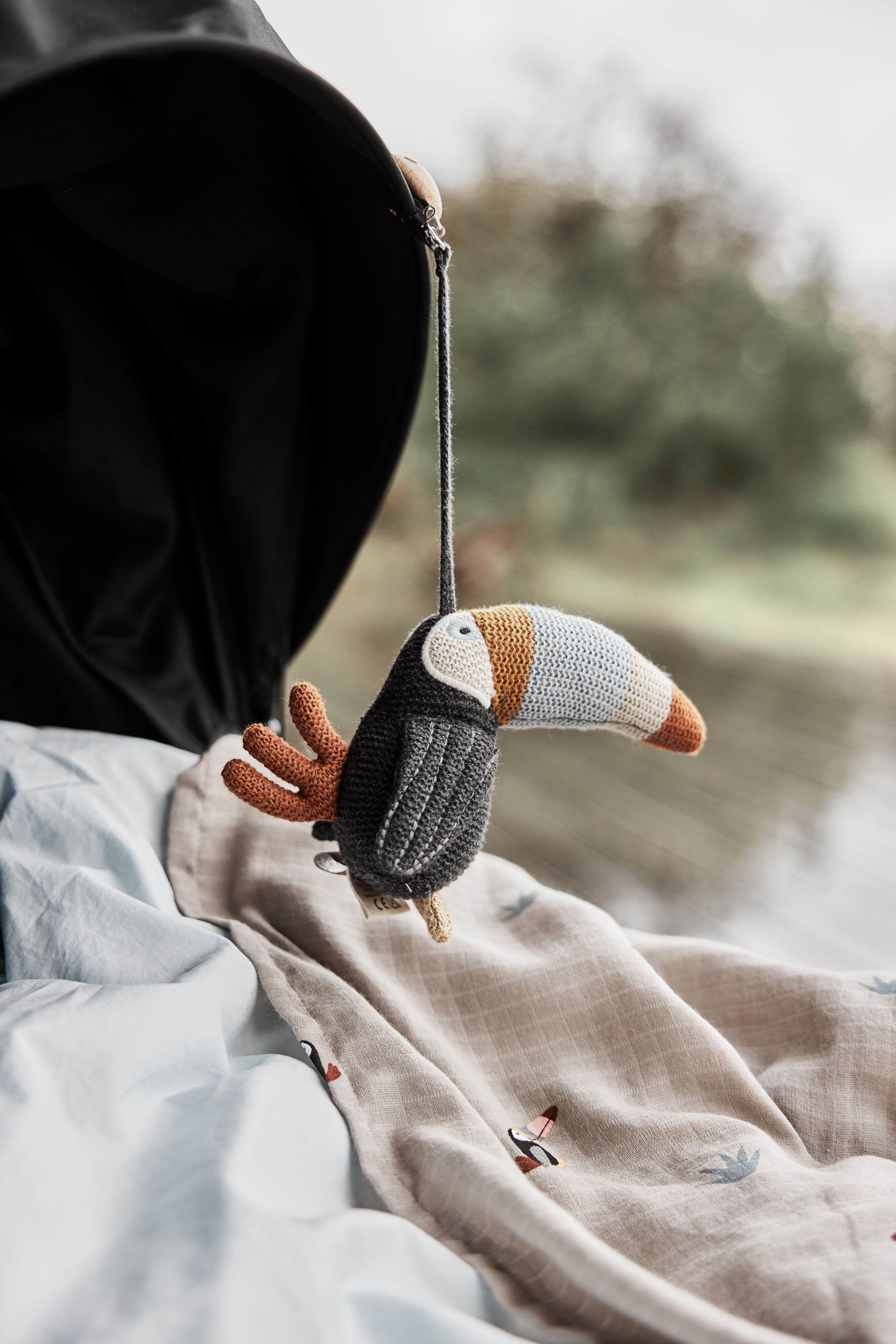 Toucan Barnvagnsleksak, Mång